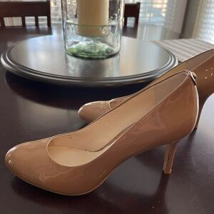 Michael Kors patent pumps